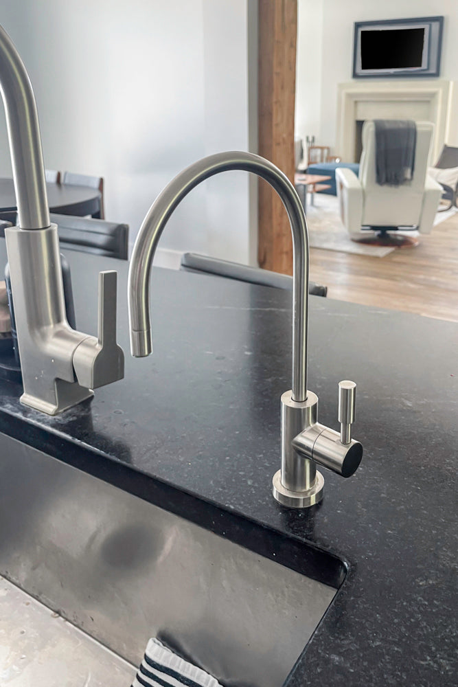 Transitional White Kitchen with Marble Waterfall Island and Thermador Appliances