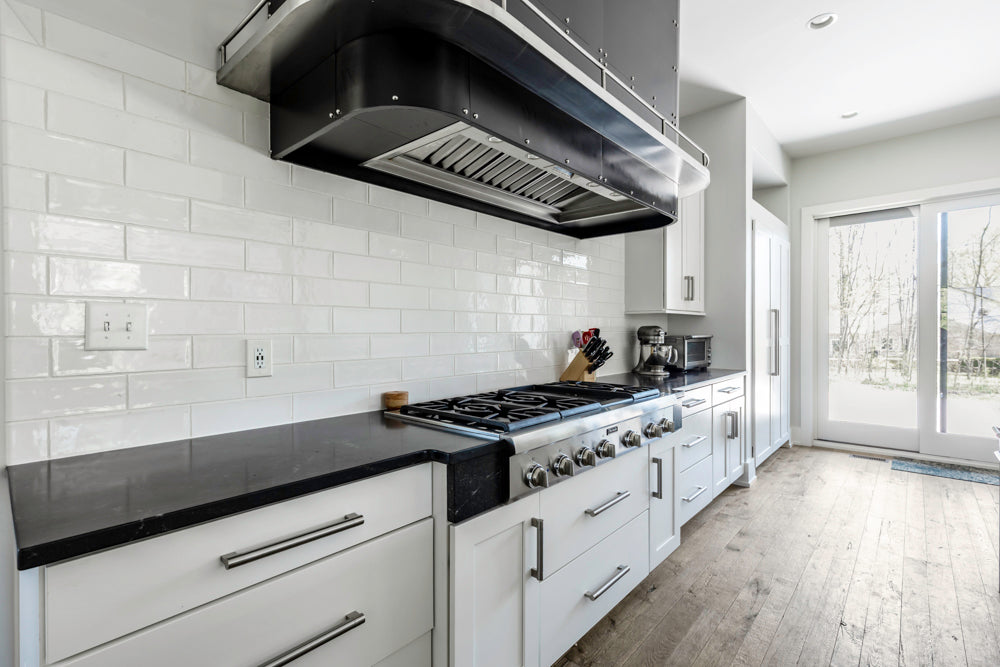 Transitional White Kitchen with Marble Waterfall Island and Thermador Appliances