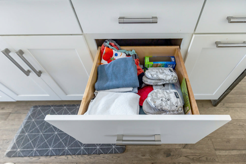 Transitional White Kitchen with Marble Waterfall Island and Thermador Appliances