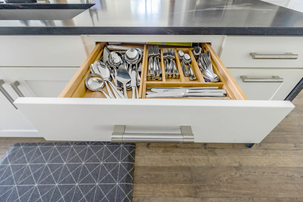 Transitional White Kitchen with Marble Waterfall Island and Thermador Appliances