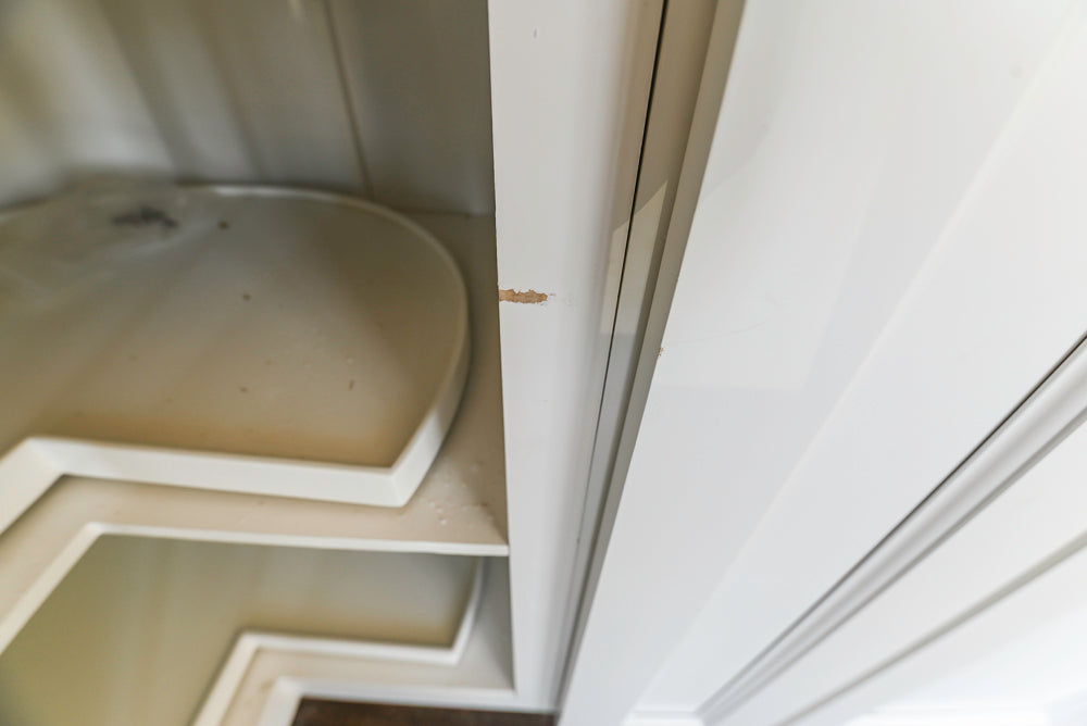 Forevermark Traditional White Kitchen Corner with White Marble Countertops