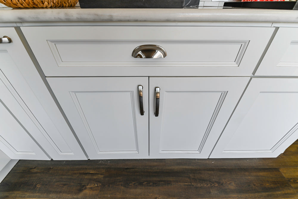 Forevermark Traditional White Kitchen Corner with White Marble Countertops