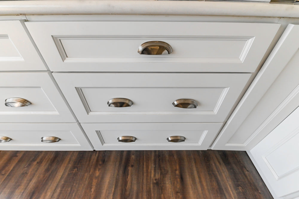 Forevermark Traditional White Kitchen Corner with White Marble Countertops