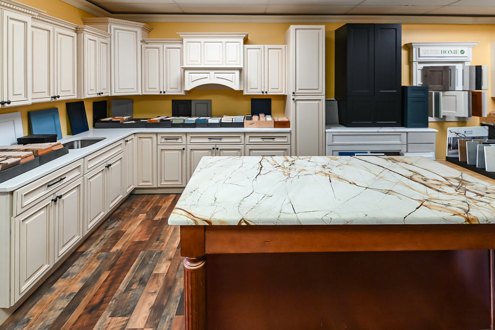 Light Cream Kitchen Corner with Quartz Countertops and Marble Top Island