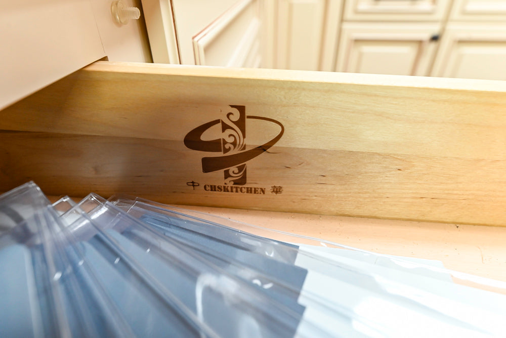 Light Cream Kitchen Corner with Quartz Countertops and Marble Top Island