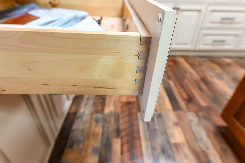 Light Cream Kitchen Corner with Quartz Countertops and Marble Top Island