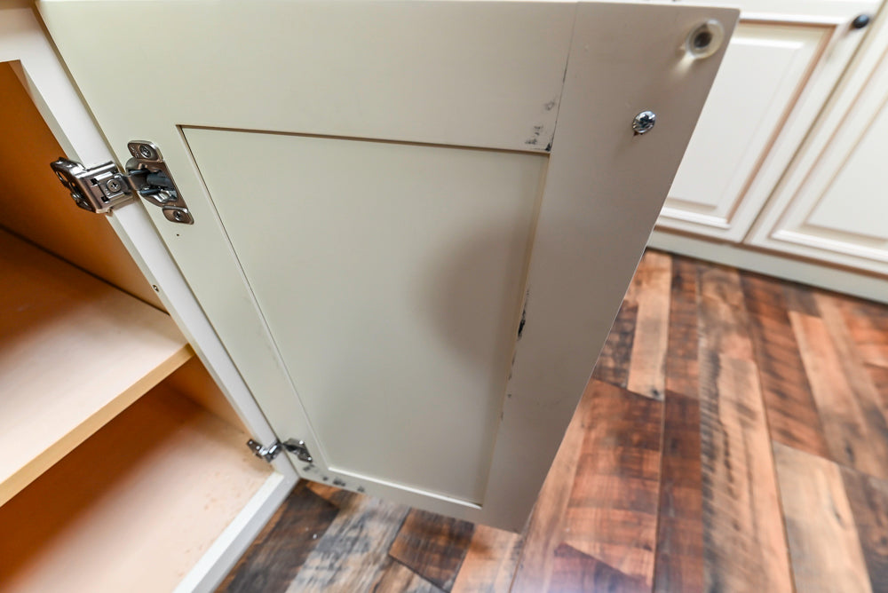 Light Cream Kitchen Corner with Quartz Countertops and Marble Top Island