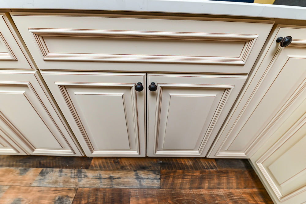 Light Cream Kitchen Corner with Quartz Countertops and Marble Top Island