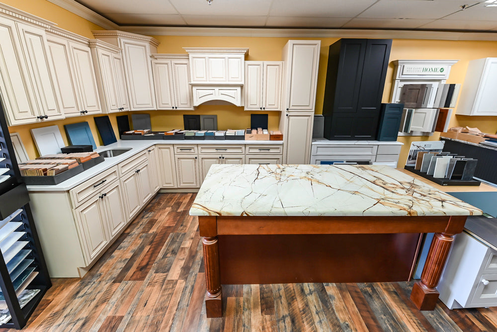 Light Cream Kitchen Corner with Quartz Countertops and Marble Top Island