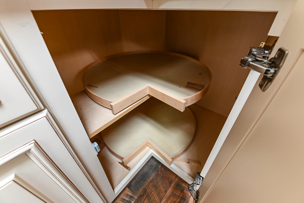 Light Cream Kitchen Corner with Quartz Countertops and Marble Top Island
