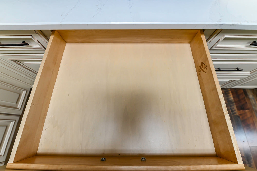 Light Cream Kitchen Corner with Quartz Countertops and Marble Top Island