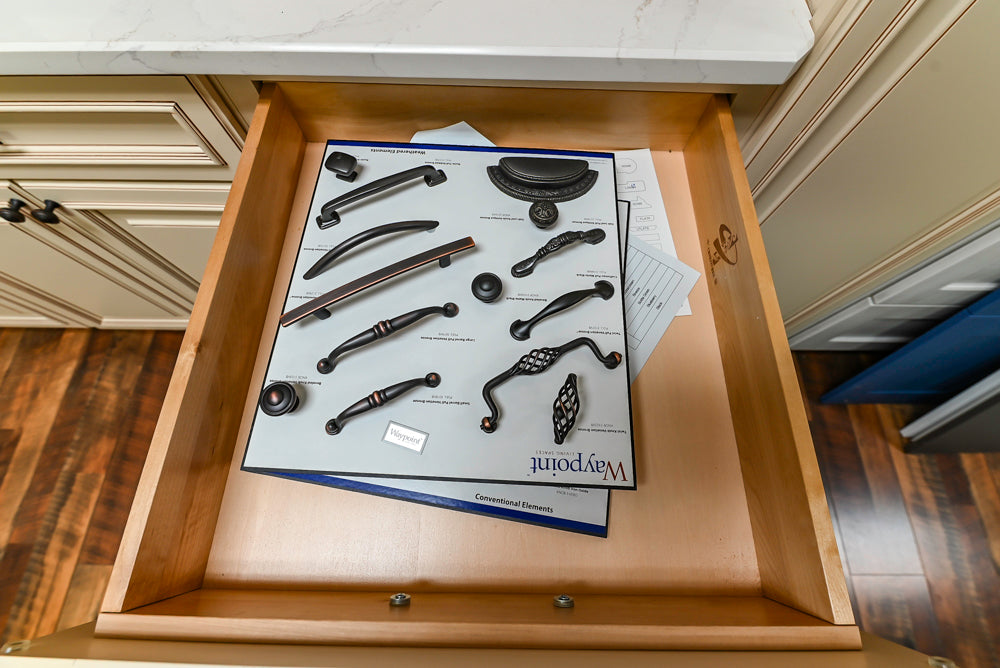 Light Cream Kitchen Corner with Quartz Countertops and Marble Top Island