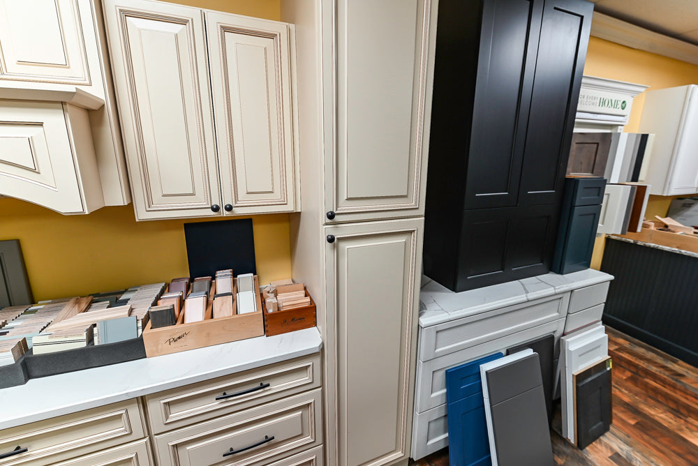 Light Cream Kitchen Corner with Quartz Countertops and Marble Top Island
