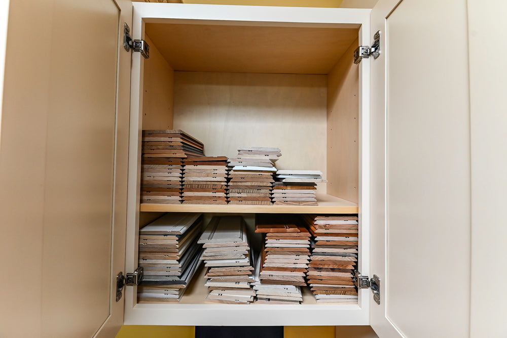 Light Cream Kitchen Corner with Quartz Countertops and Marble Top Island