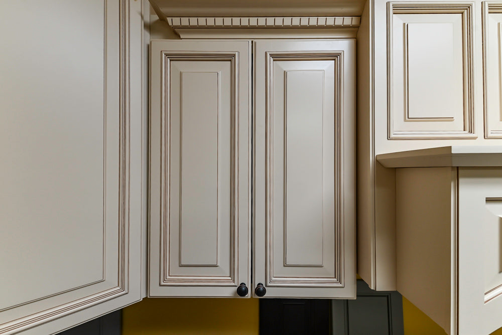 Light Cream Kitchen Corner with Quartz Countertops and Marble Top Island
