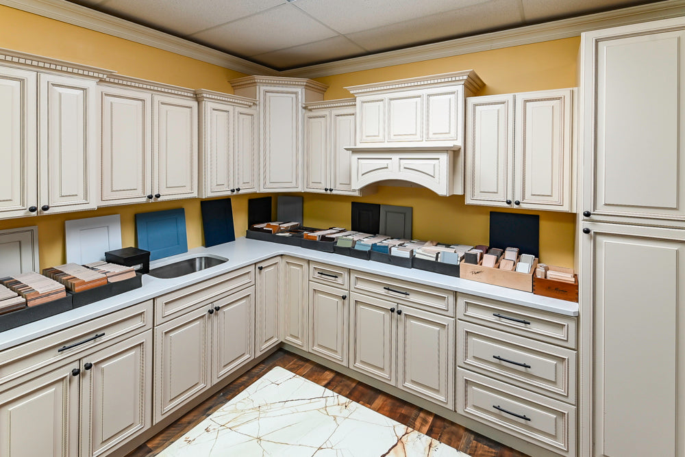 Light Cream Kitchen Corner with Quartz Countertops and Marble Top Island