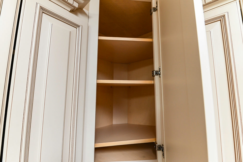 Light Cream Kitchen Corner with Quartz Countertops and Marble Top Island