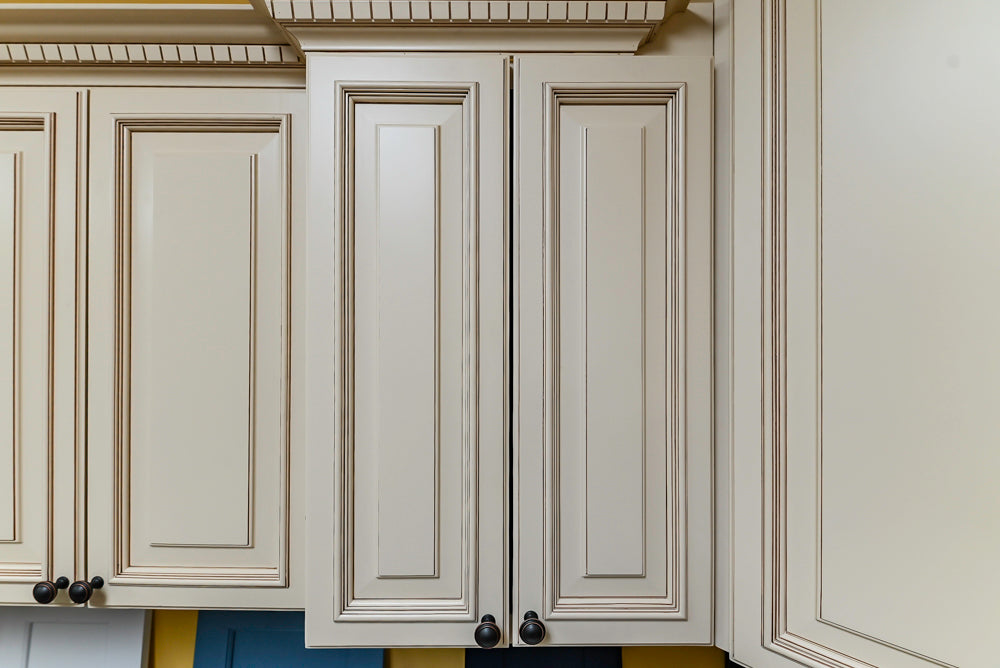 Light Cream Kitchen Corner with Quartz Countertops and Marble Top Island
