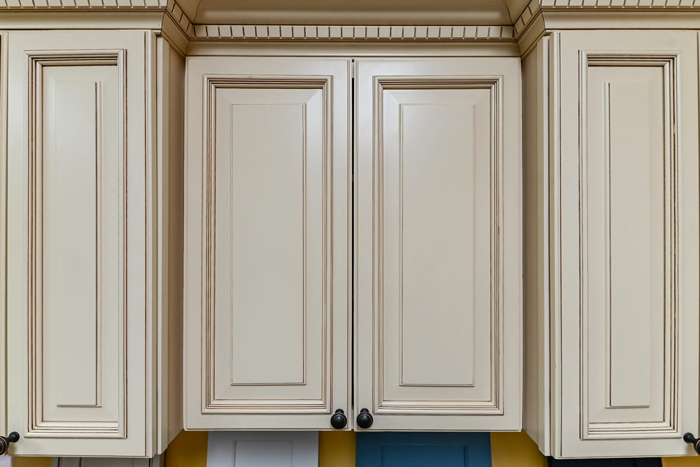 Light Cream Kitchen Corner with Quartz Countertops and Marble Top Island