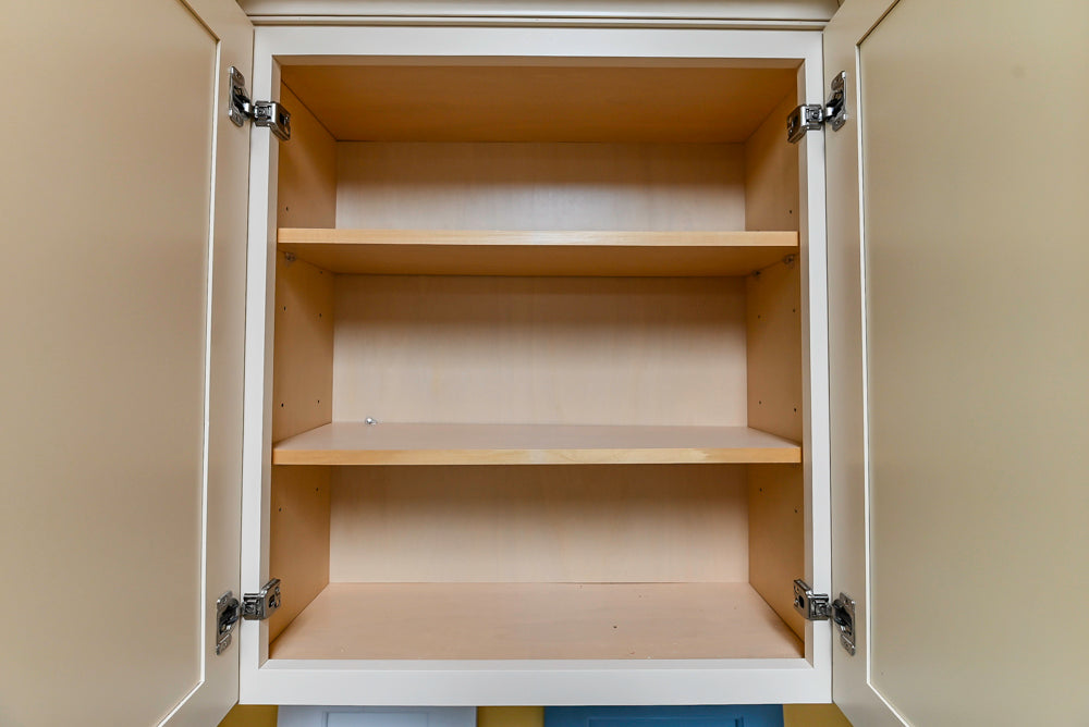 Light Cream Kitchen Corner with Quartz Countertops and Marble Top Island