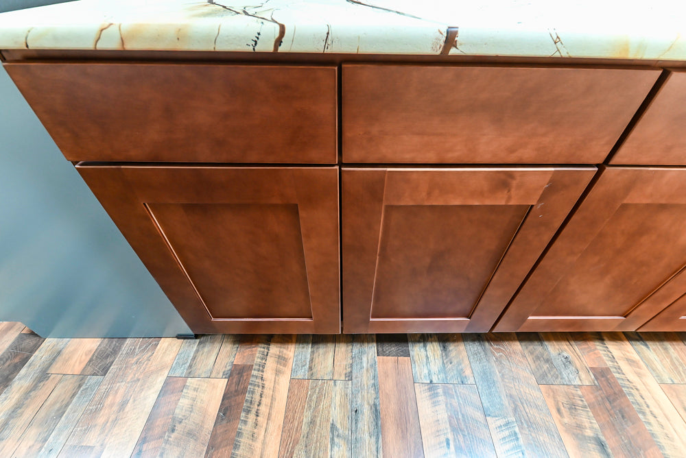 Light Cream Kitchen Corner with Quartz Countertops and Marble Top Island