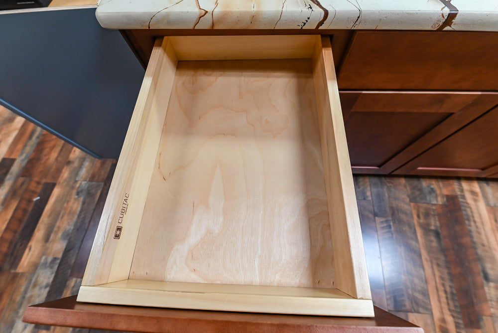 Light Cream Kitchen Corner with Quartz Countertops and Marble Top Island