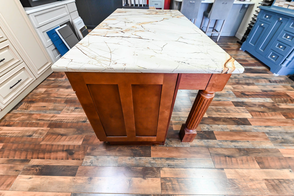 Light Cream Kitchen Corner with Quartz Countertops and Marble Top Island
