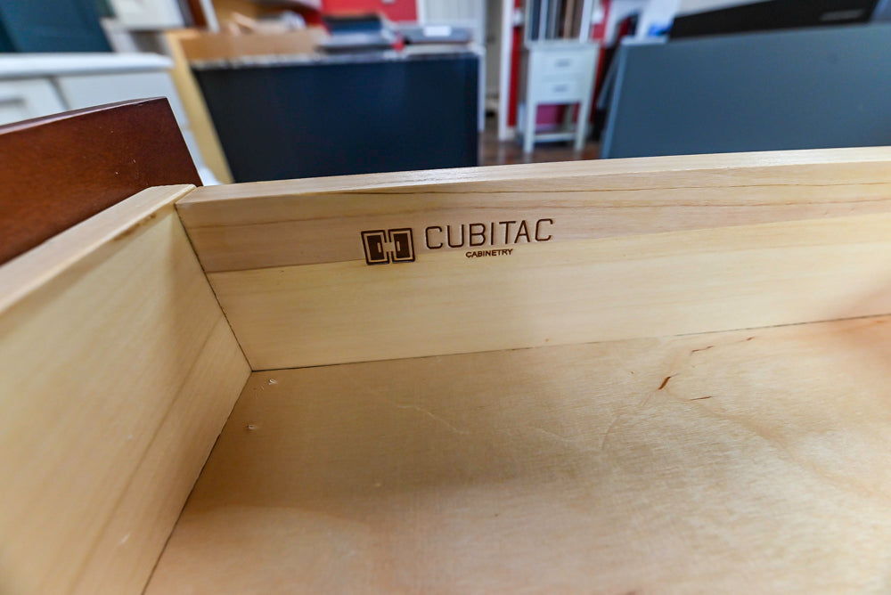 Light Cream Kitchen Corner with Quartz Countertops and Marble Top Island