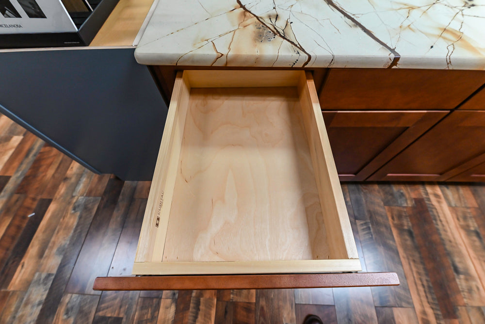 Light Cream Kitchen Corner with Quartz Countertops and Marble Top Island