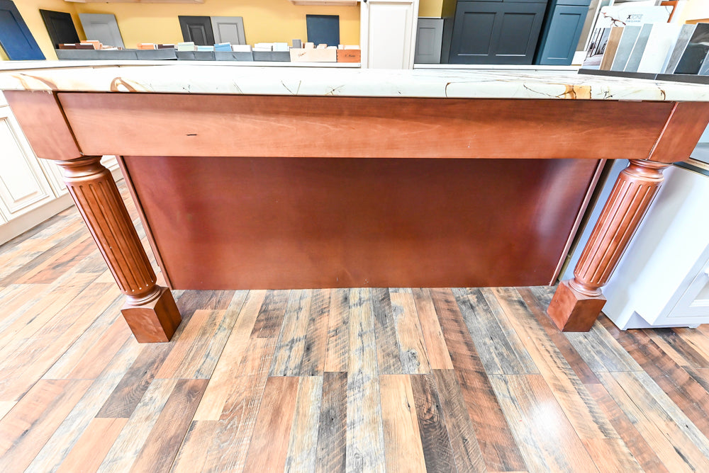 Light Cream Kitchen Corner with Quartz Countertops and Marble Top Island