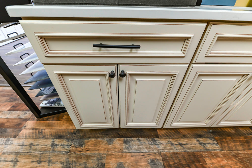 Light Cream Kitchen Corner with Quartz Countertops and Marble Top Island