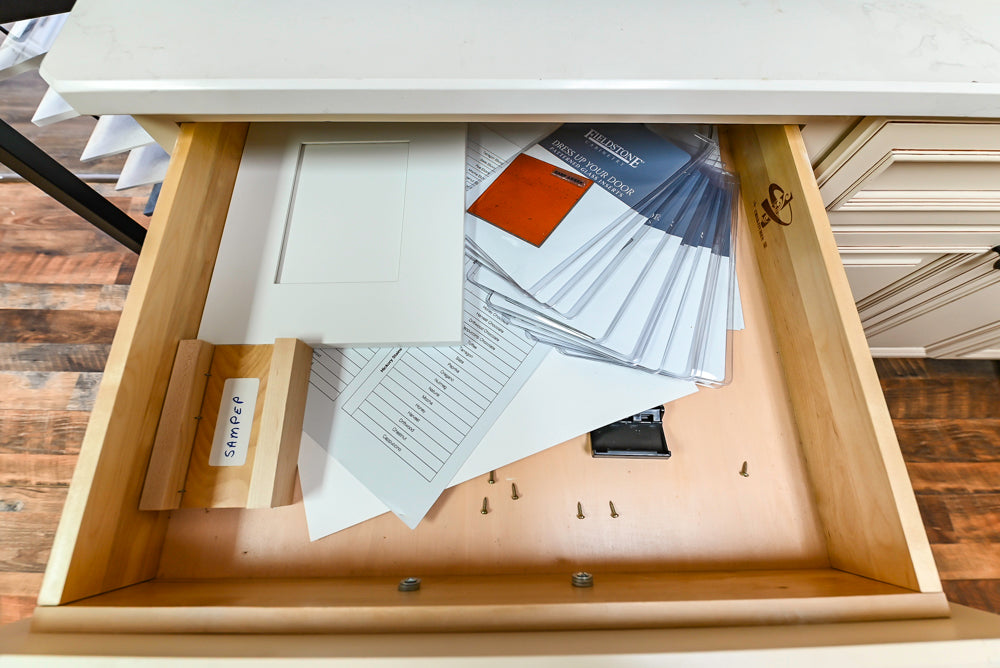 Light Cream Kitchen Corner with Quartz Countertops and Marble Top Island
