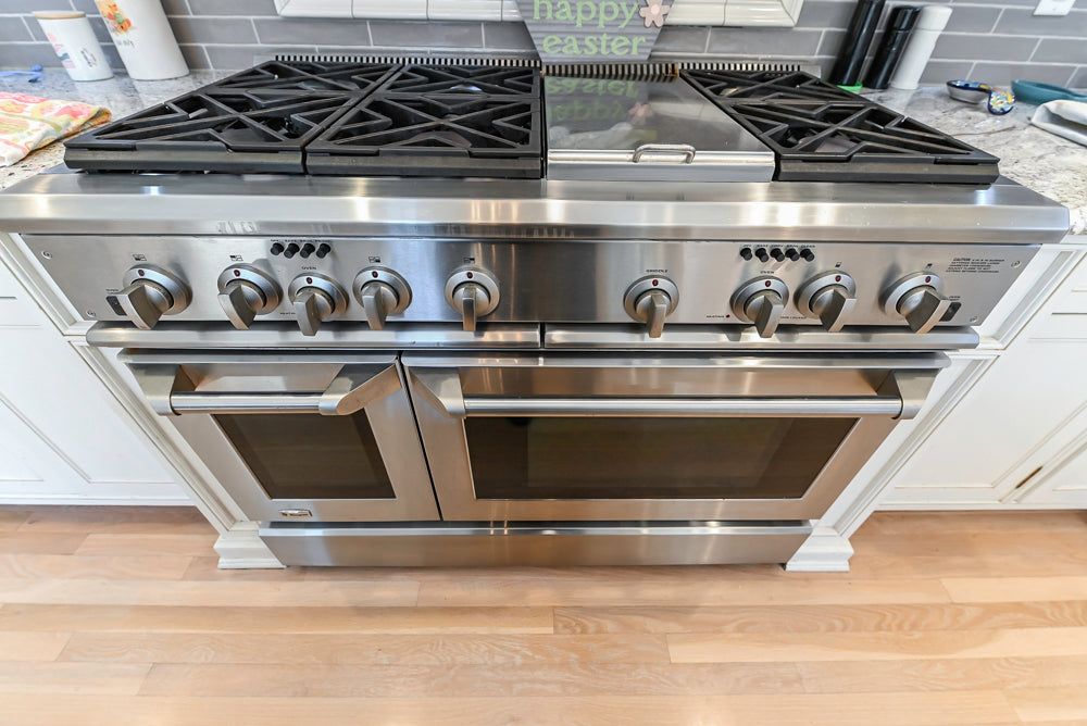 Custom Traditional Cream Kitchen with Island, Granite Countertops and 48" Range