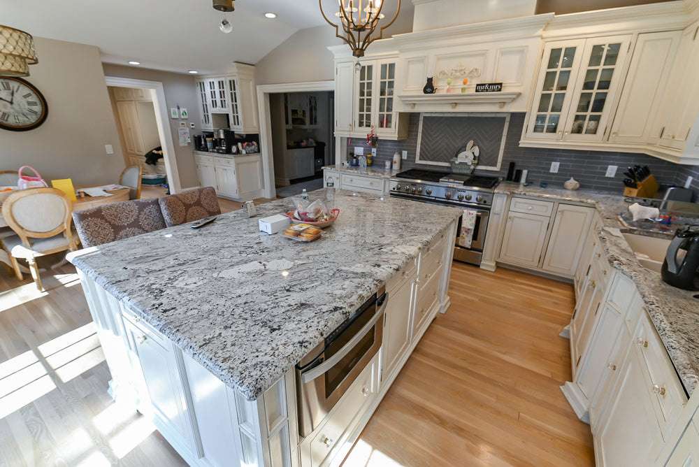 Custom Traditional Cream Kitchen with Island, Granite Countertops and 48" Range