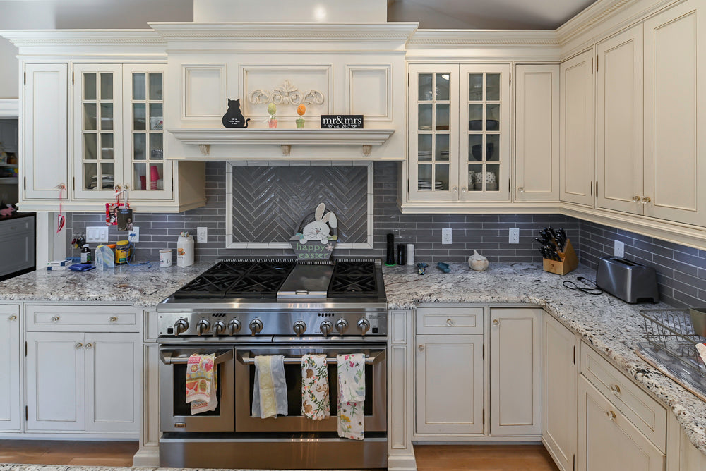 Custom Traditional Cream Kitchen with Island, Granite Countertops and 48" Range