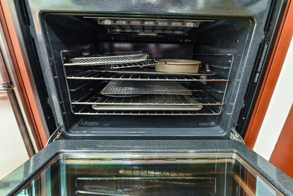 Poggenpohl Brown Toned Transitional Kitchen with Marble Countertops and Appliances