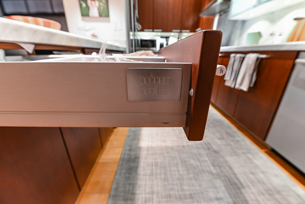 Poggenpohl Brown Toned Transitional Kitchen with Marble Countertops and Appliances