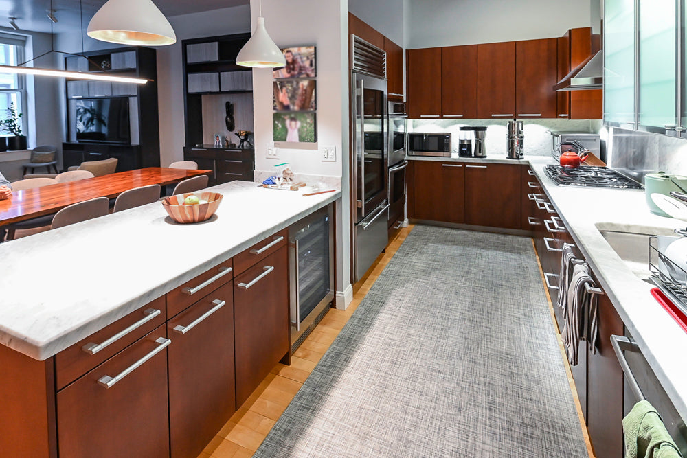 Poggenpohl Brown Toned Transitional Kitchen with Marble Countertops and Appliances