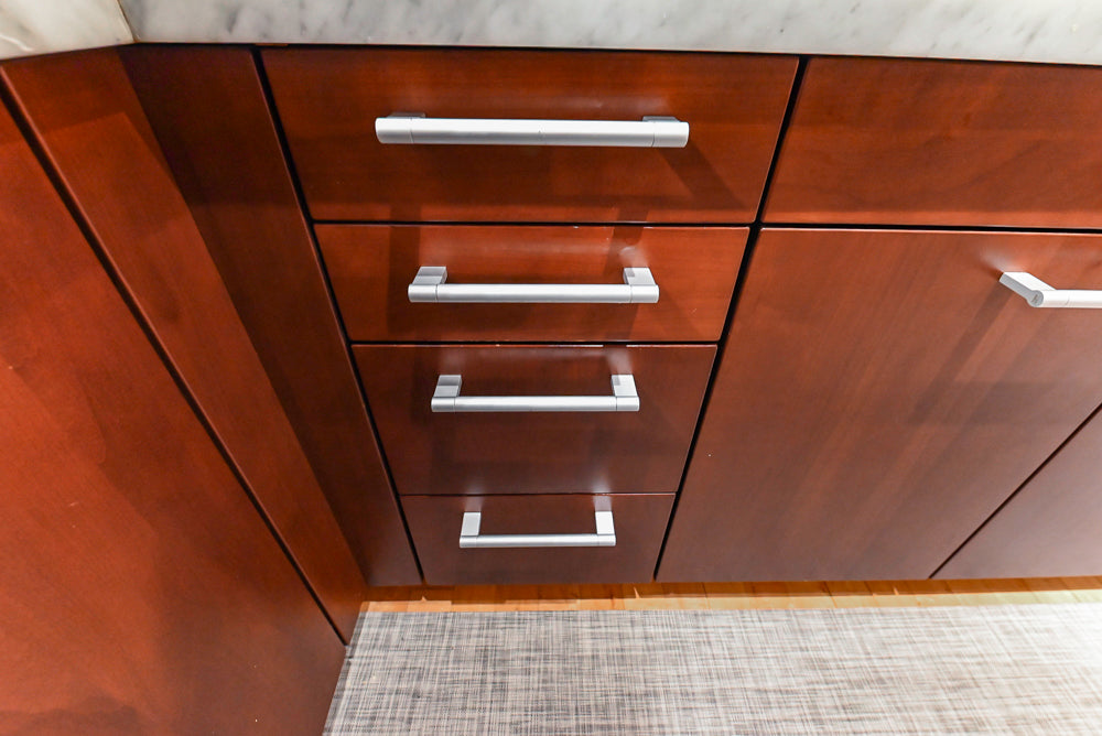 Poggenpohl Brown Toned Transitional Kitchen with Marble Countertops and Appliances