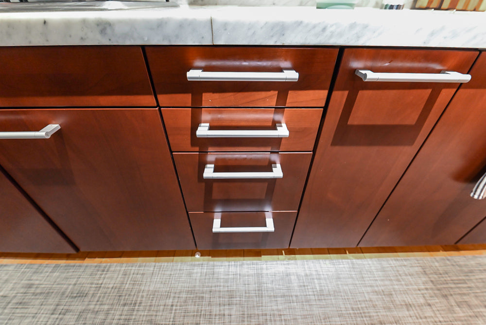 Poggenpohl Brown Toned Transitional Kitchen with Marble Countertops and Appliances