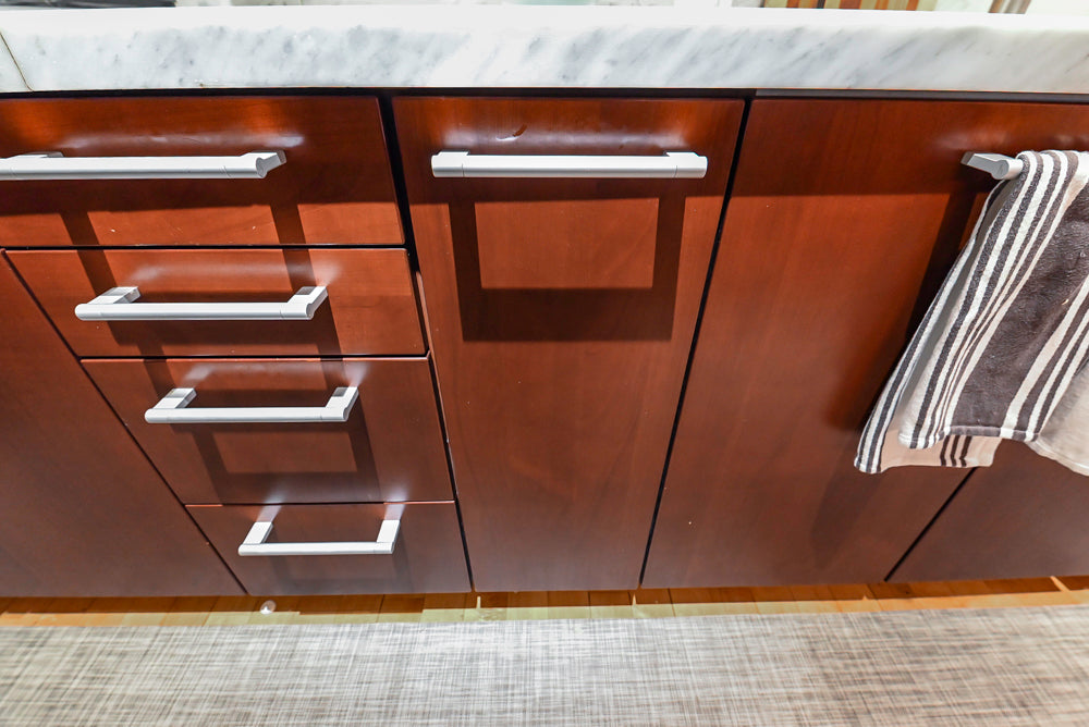 Poggenpohl Brown Toned Transitional Kitchen with Marble Countertops and Appliances