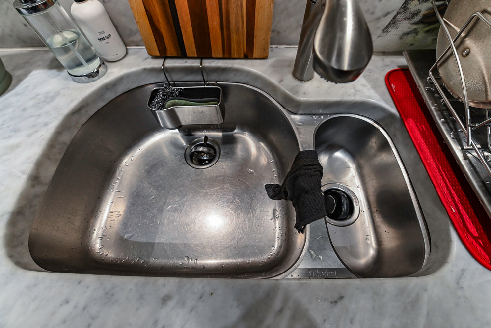 Poggenpohl Brown Toned Transitional Kitchen with Marble Countertops and Appliances