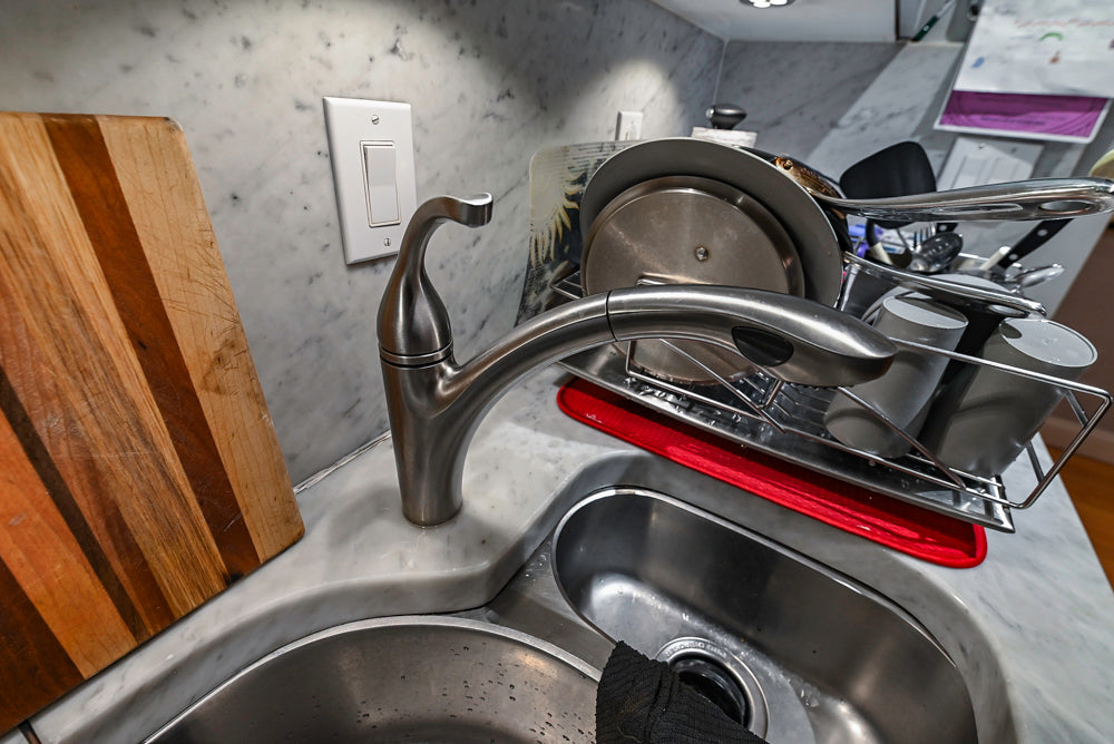 Poggenpohl Brown Toned Transitional Kitchen with Marble Countertops and Appliances
