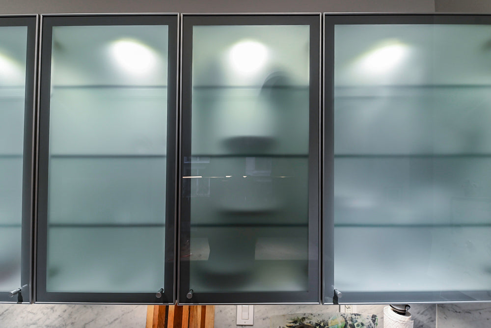 Poggenpohl Brown Toned Transitional Kitchen with Marble Countertops and Appliances