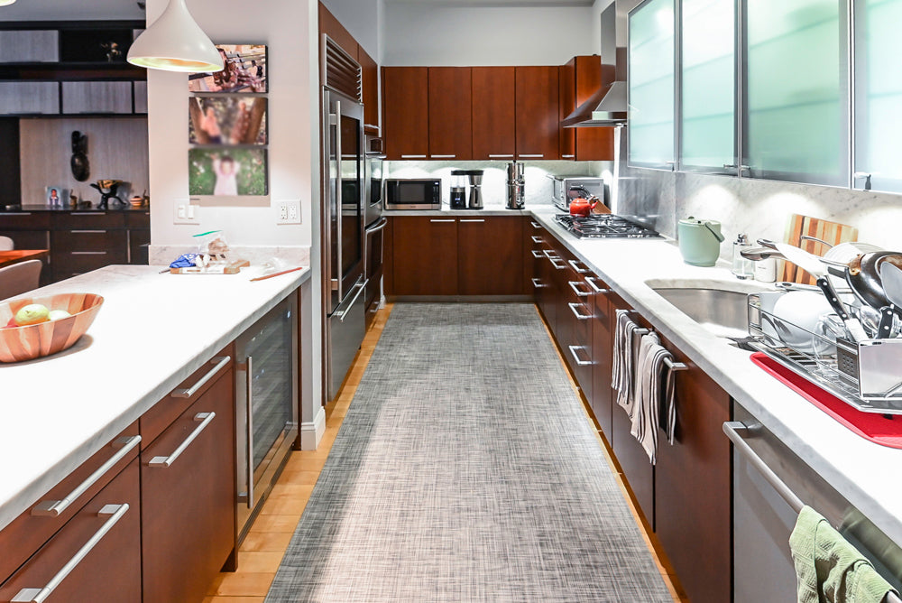 Poggenpohl Brown Toned Transitional Kitchen with Marble Countertops and Appliances