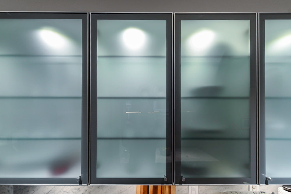 Poggenpohl Brown Toned Transitional Kitchen with Marble Countertops and Appliances