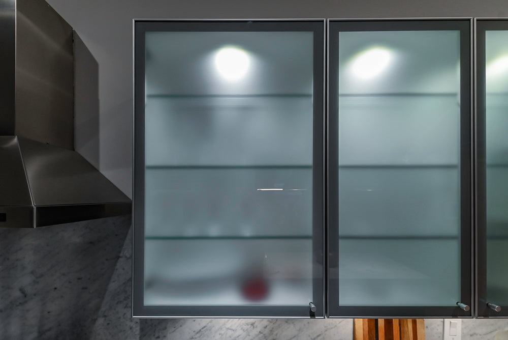 Poggenpohl Brown Toned Transitional Kitchen with Marble Countertops and Appliances