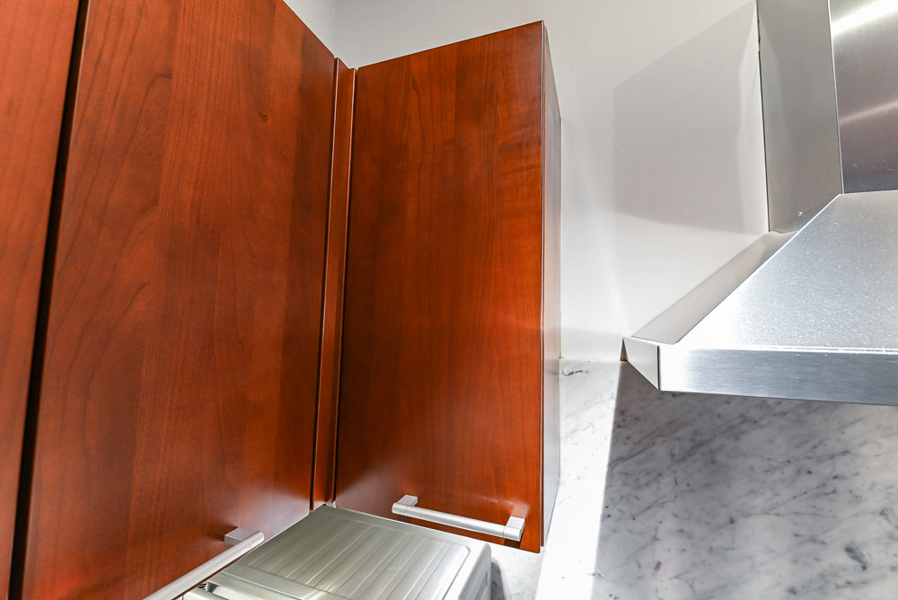 Poggenpohl Brown Toned Transitional Kitchen with Marble Countertops and Appliances