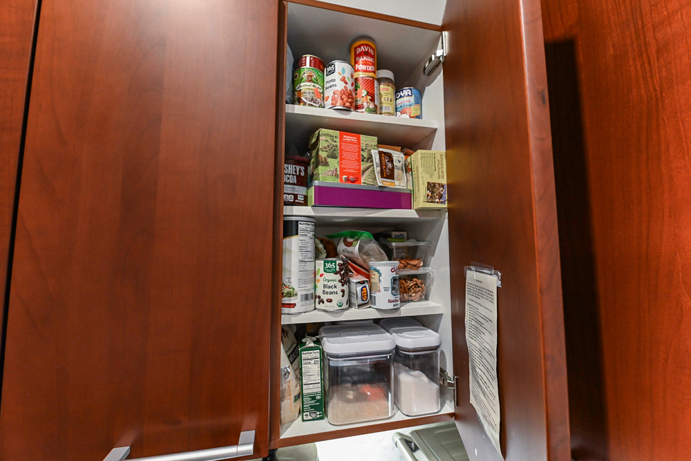 Poggenpohl Brown Toned Transitional Kitchen with Marble Countertops and Appliances