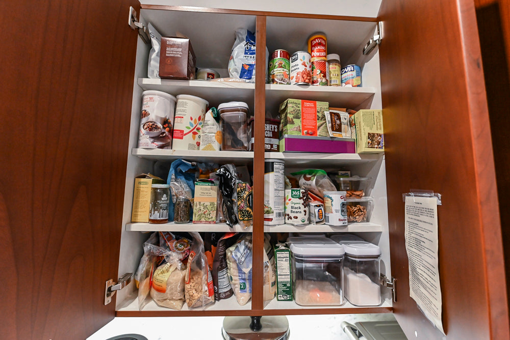 Poggenpohl Brown Toned Transitional Kitchen with Marble Countertops and Appliances